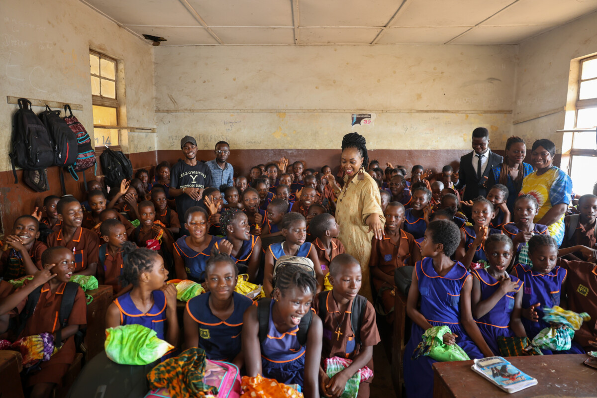 Dr. Yakama Jones helps class six students at SM Broderick to support education in Sierra Leone